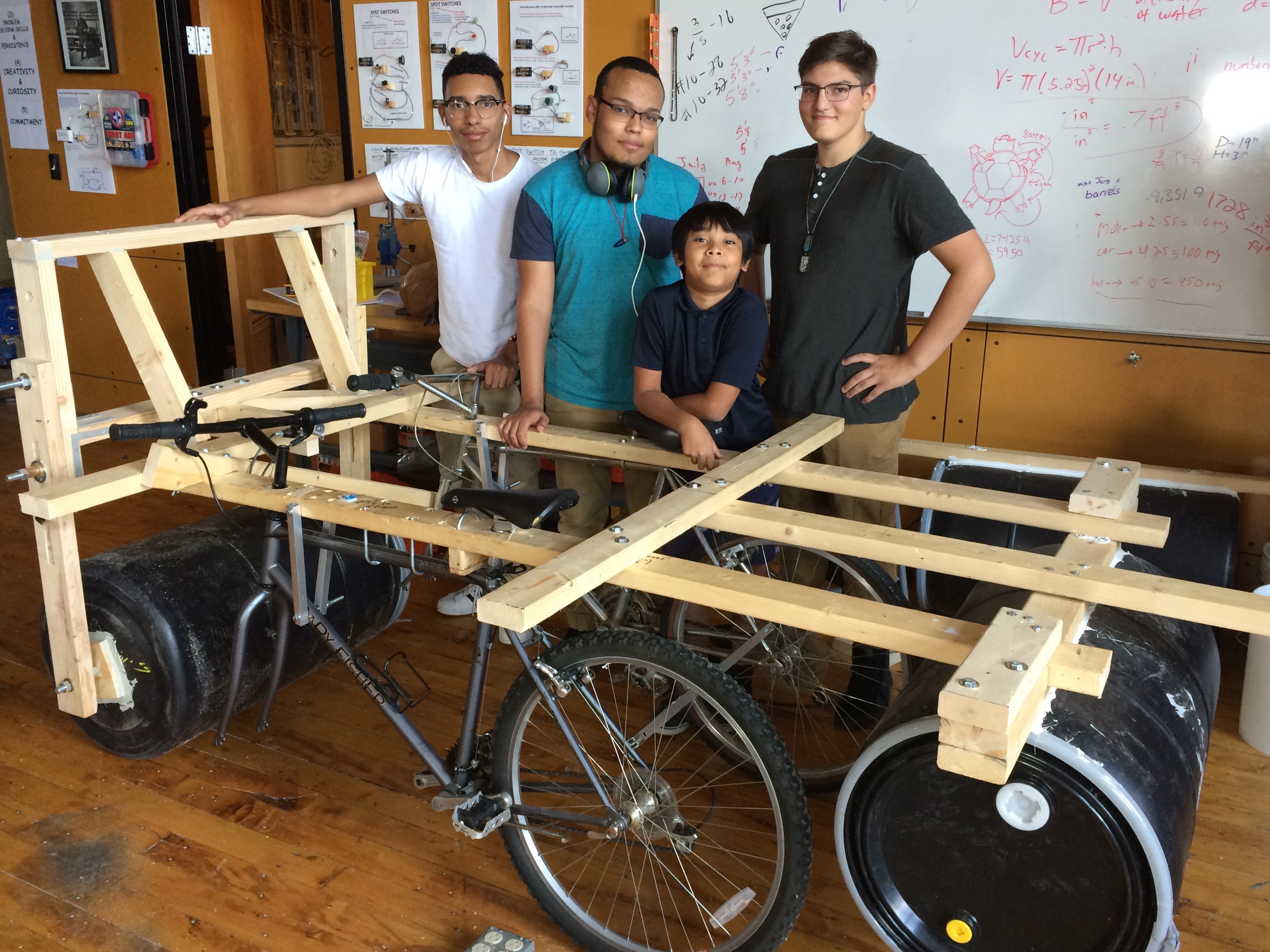 wood vehicle frame built on two bicycles