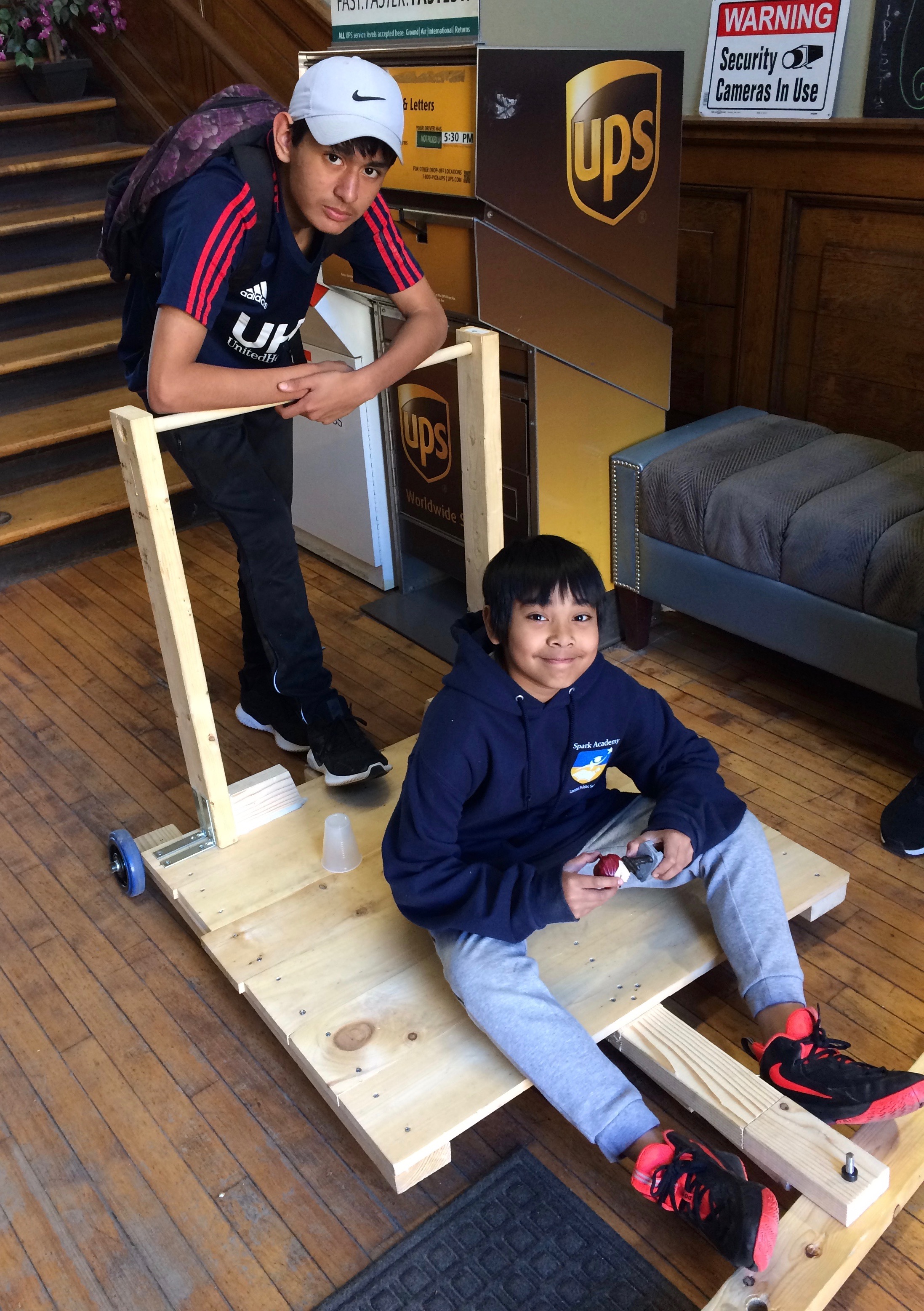 hand-pushed cart students built for a school project